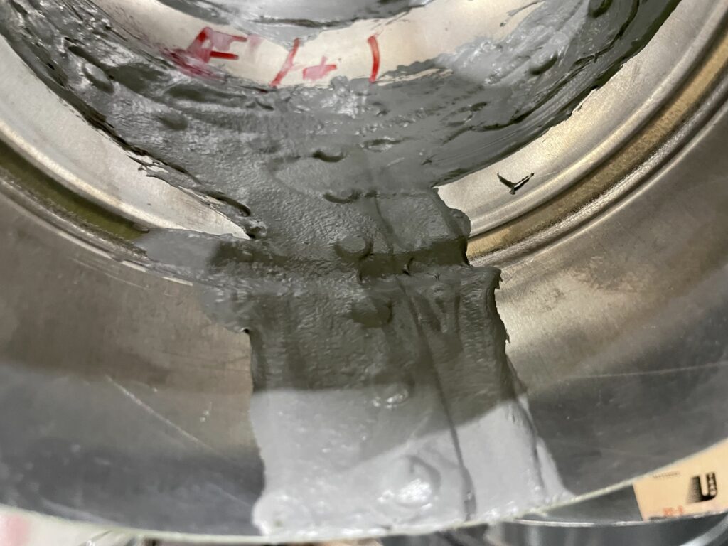 Duct elbow with MEI sealant on seam